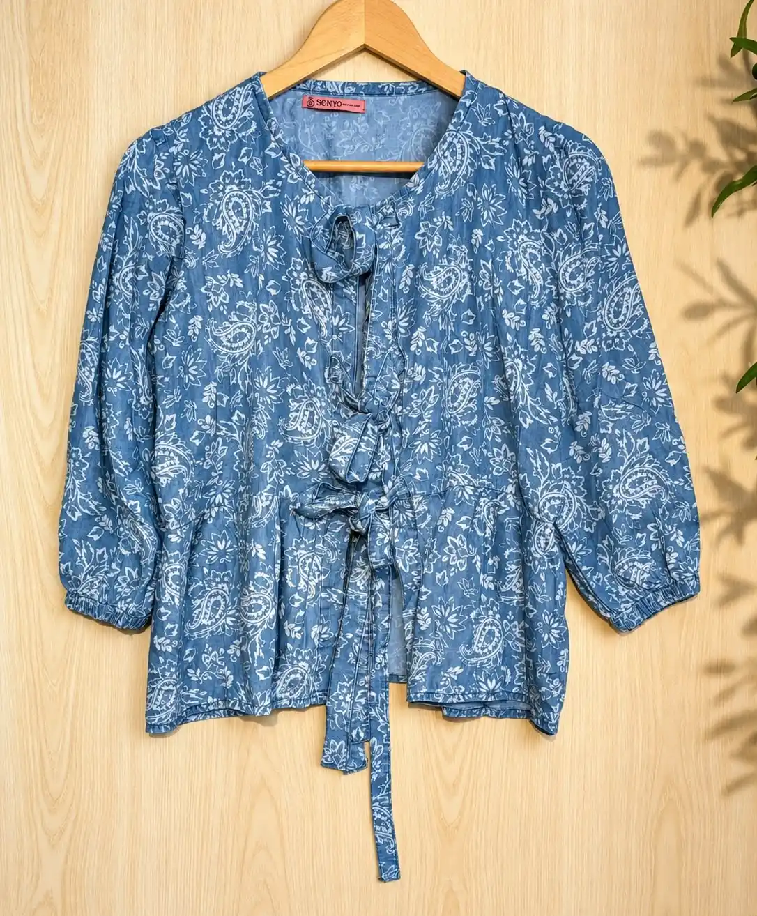 winter_top01_1250 Slate Blue Front-Tie Peplum Top - Image 1